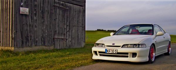 EDM Integra Type-R next to a barn jdm front end