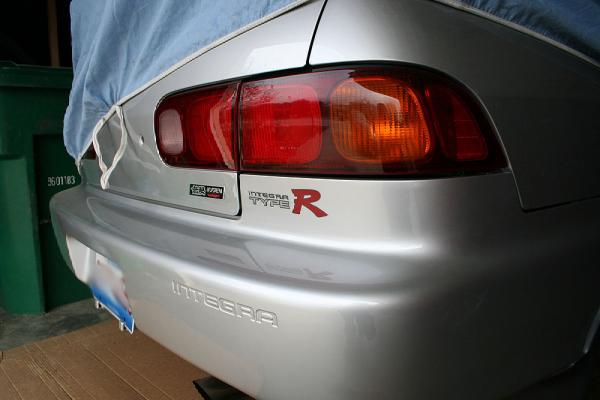 Vogue Silver Metallic 1997 JDM Integra Type-R safely in the garage