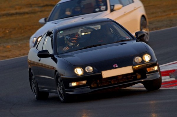 1999 Starlight Black Pearl Integra Type R at the race track