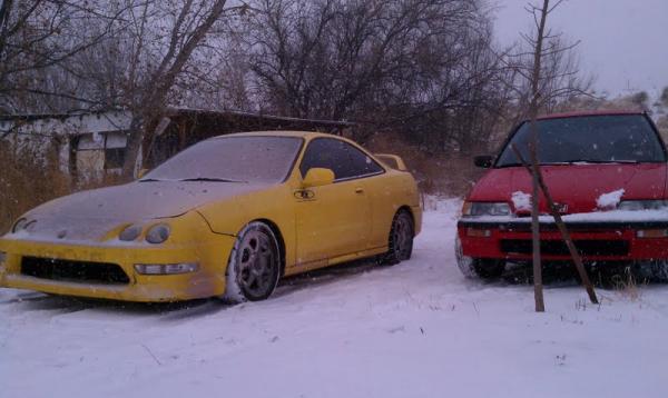 Phoenix Yellow Acura Integra Type-R getting snowed on