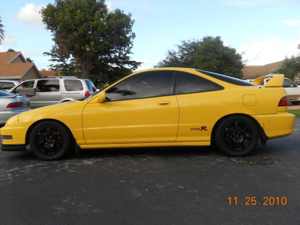 Phoenix Yellow ITR with OEM black wheels