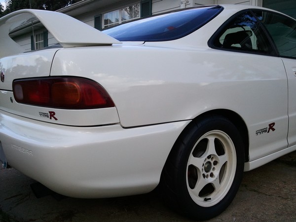 championship white 1997 Acura Integra Type-R with white wheels