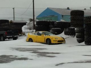 Phoenix Yellow 2000 Acura Integra Type-r in the snow