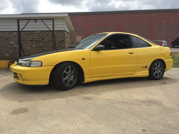 2001 Phoenix Yellow ITR with JDM front and black spoiler