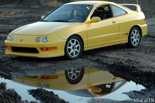 01' PY ITR next to a puddle