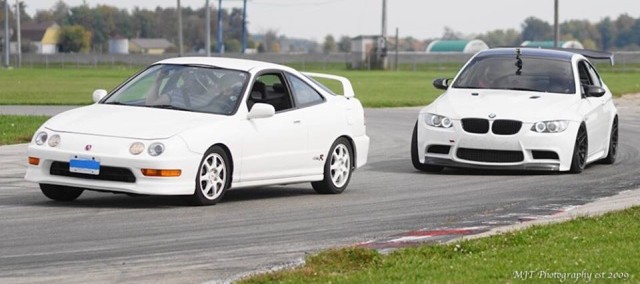 Stock 1998 Championship White USDM Acura Integra Type-R at track